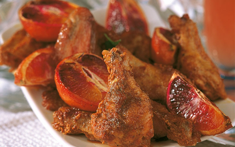 جوانح مشوية مع البرتقال