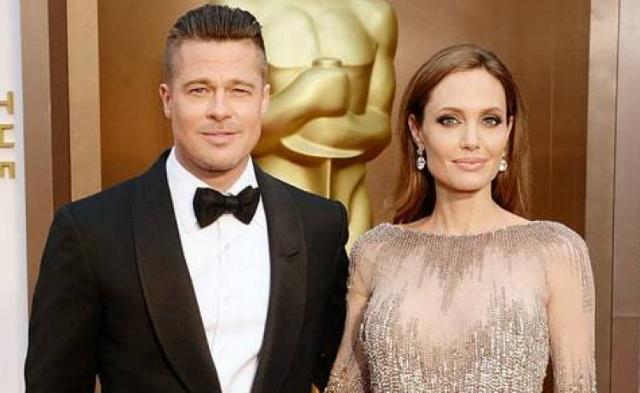 بالصور - براد بيت يقع في غرام شبيهة انجلينا جولي التي تصغره بـ32 عاماً