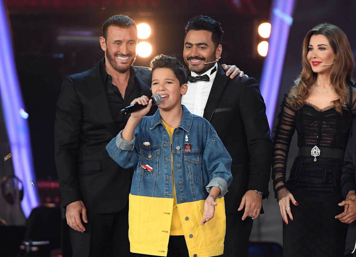 بالفيديو - هكذا سرّب تامر حسني اسم الفائز بـ the Voice kids قبل اعلانه