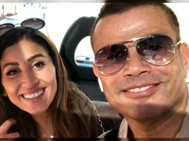 صور دينا الشربيني بالـ"مايوه" في أحضان عمرو دياب تشعل المواقع