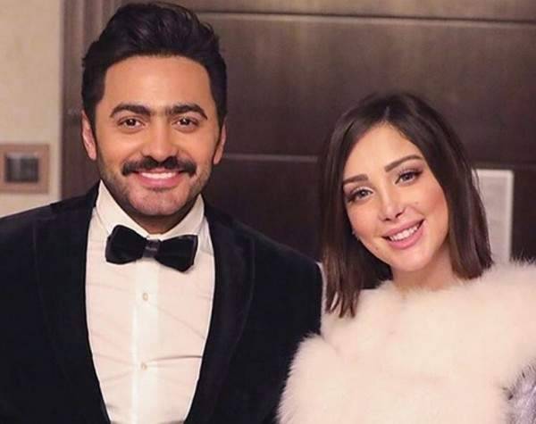 بالفيديو والصور - جمهور تامر حسني يكشف المستور: بسمة بوسيل في أميركا لإنجاب طفلها الثالث!