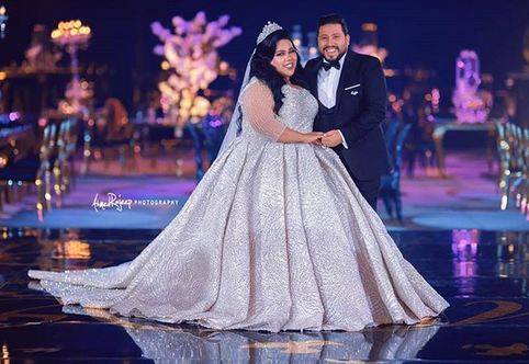 بالصور - فستان زفاف شيماء سيف يبهر الجميع.. الأفضل للعروس الممتلئة