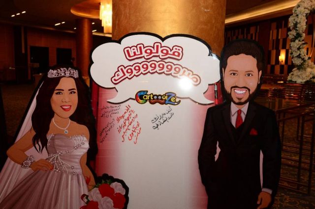 صورة لشيماء ومحمد في مدخل القاعة