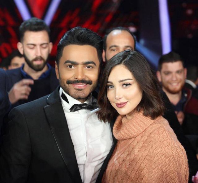 بالصورة - التعليق الأول لبسمة بوسيل على مرض تامر حسني... ماذا قالت عنه؟