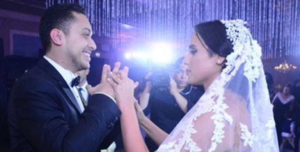 بالصور - هذه العروس إبنة نجم شهير.. خمنوا من هو من الشبه؟