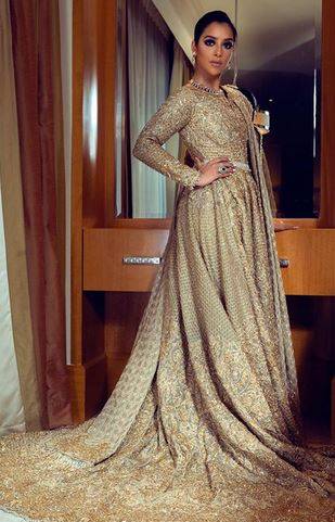 بالصور - بلقيس ترد بشكل حاسم على منتقدي فستانها الضخم وثمنه الخيالي