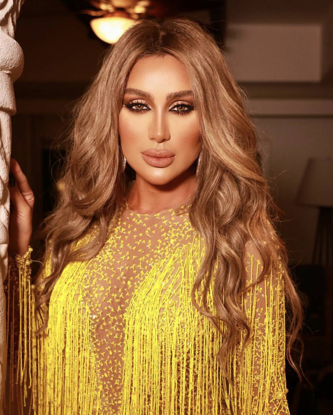 بالصور - من هو مصمم فستان مايا دياب العصري والجريء؟