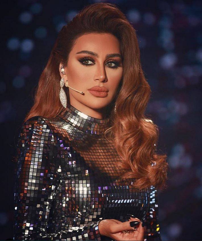 بالفيديو - بعد الصور التي كشفت عملية التجميل السيئة في وجهها... شاهدوا كيف كانت مايا دياب قبل 21 عاماً