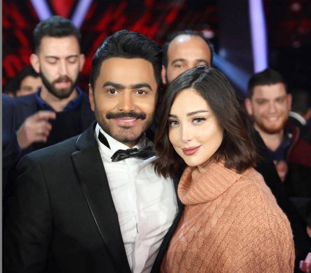 بالفيديو - بعد تحذير بسمة بوسيل منها... تامر حسني يكشف حقيقة العلاقة بينها وبين أسيل عمران