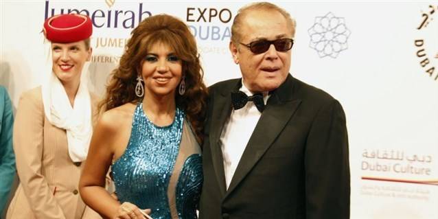 بالصور - أرملة محمود عبد العزيز تثير الجدل بعمليات التجميل ووجهها المنفوخ والشفاه البنفسجية