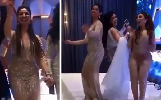 بالفيديو - نجمة خليجية تثير الجدل برقصها في زفاف شقيقتها... وفتحات ملابسها