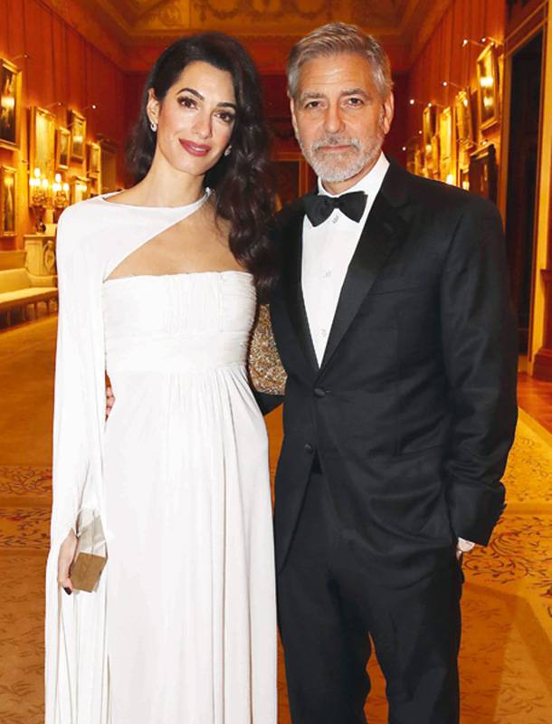 أمل وجورج كلوني
في قصر باكنغهام