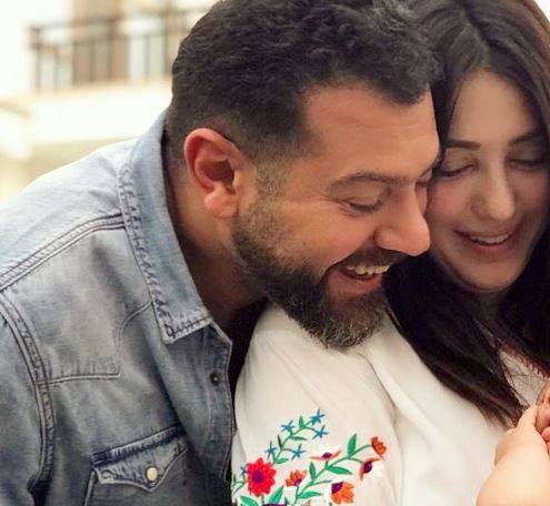 بالصور - بعد بيع فستان زفافها.. كندة علوش وعمرو يوسف في مبادرة انسانية لافتة