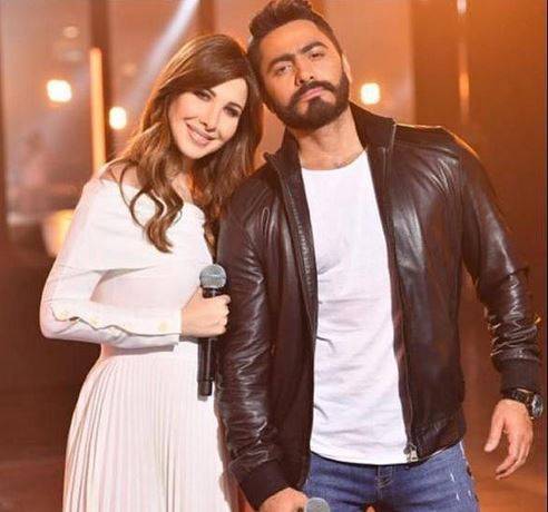 فيديو من كواليس إعلان تامر حسني.. شاهدوا ماذا فعل بنانسي عجرم