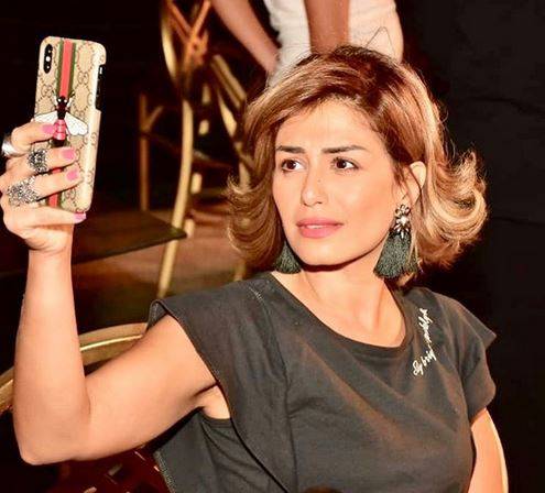 بالصور - انتقادات حادة لمنة فضالي بسبب ملابسها الصيفية الجريئة