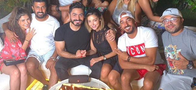 بالصور - بسمة بوسيل تحتفل بميلاد تامر حسني وتتألق بفستان صيفي قصير