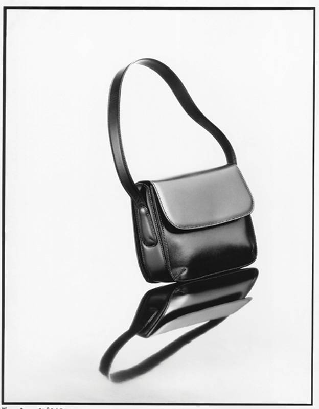 ‏GIORGIO ARMANI 
‏‏LA PRIMA 
حقائب عملية بجلود فاخرة