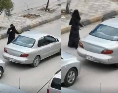 بالفيديو -  منقبة تستغل حظر التجول وترقص في الشارع