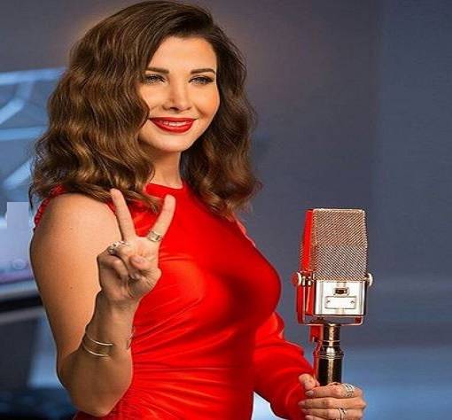 بالفيديو - نانسي عجرم تتخطى أزمة زوجها وتحمي بناتها من كورونا