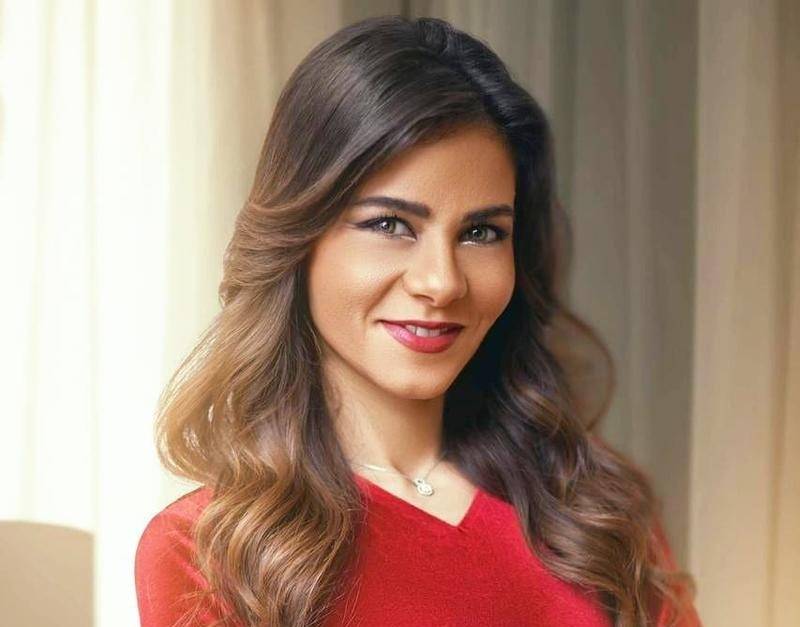 سالي فؤاد تهنئ طليقها بيوم الأب بصورة خلال حملها