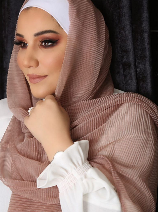 ما حقيقة خلع نجمة The Voice نداء شرارة للحجاب؟