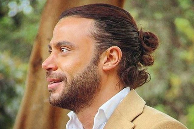 بالفيديو - محمد إمام يستعد لسباق رمضان بتمارين على شاطئ البحر