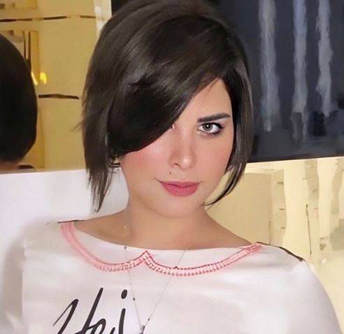 بالصور - وشم شمس الكويتية الكبير يحدث بلبلة