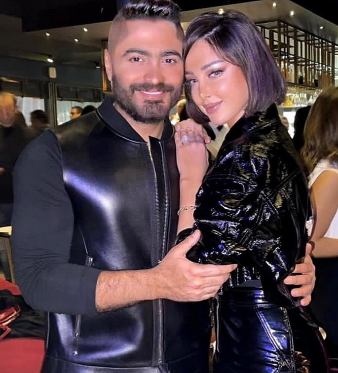 بالصور – ملامح تامر حسني وبسمة بوسيل تثير التساؤلات والجمهور يشكّك في هويتهما