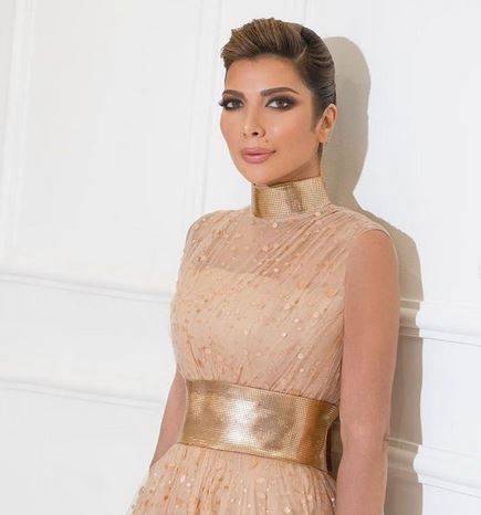 بالفيديو - أصالة نصري تتألق بفستان أحمر وتبدو شابة في الثلاثينات