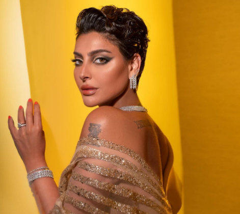 بالصور والفيديو -  فاطمة الصفي ترّد على انتقادات طاولت وشم كتفها وإطلالتها الجريئة