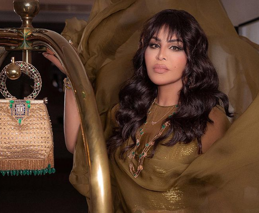 بالصور - أحلام الشامسي تتألق بإطلالة راقية وحيوية