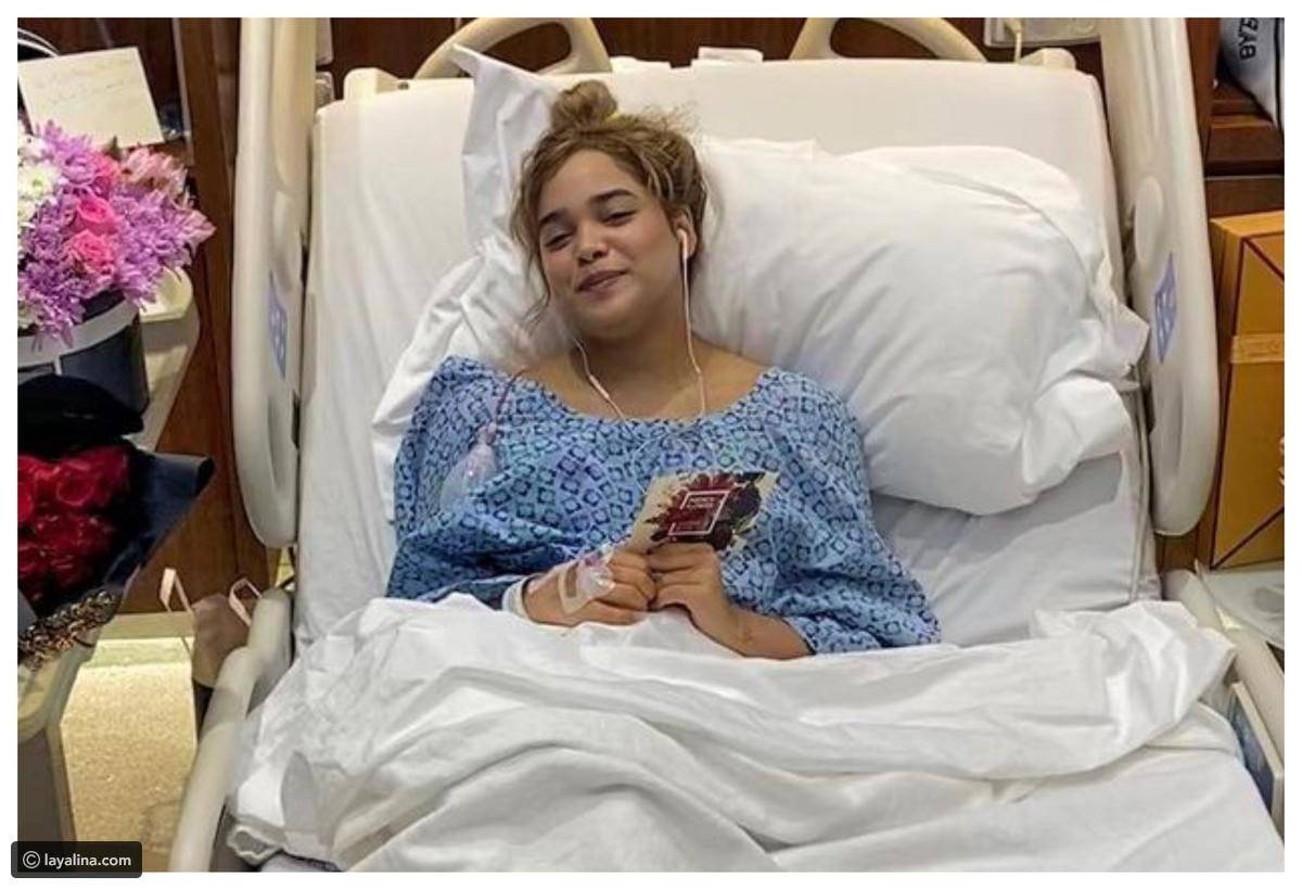 بالفيديو - مشاعل الشحي على سرير المرض وزوجها يحاول التخفيف من ألمها