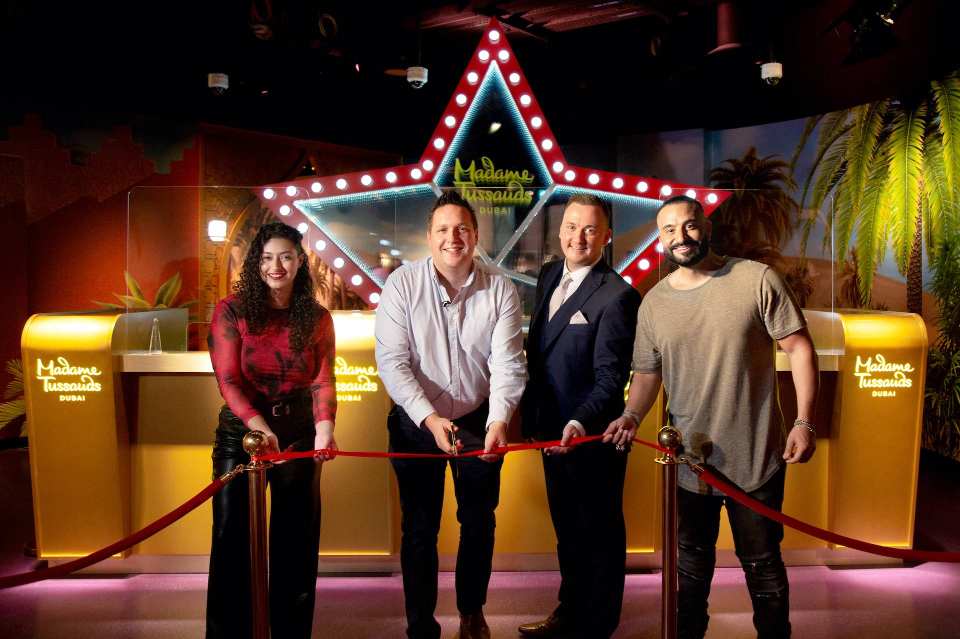 MTD Ribbon Cutting Amna Al Haddad pioneering Emirati Athlete & Olympic weightlifterSteve Blackburn Director of New Openings at Merlin EntertainmentsJack Bennett, Head of Operations, New OpeningsKris Fade radio ho