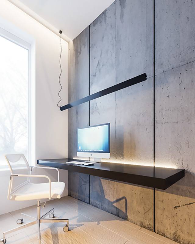 الكومبيوتر على خلفية الباطون الخام، مناسب للمكان