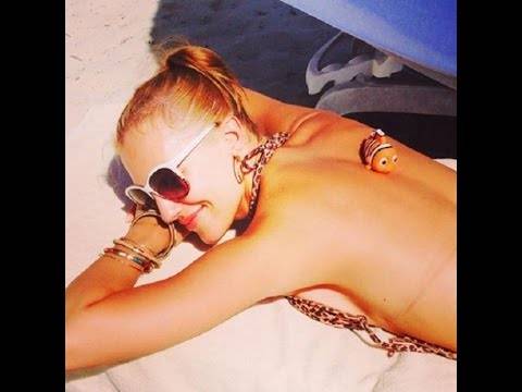 بالفيديو - مريم أوزرلي تلاعب ابنتيها في حمّام السباحة