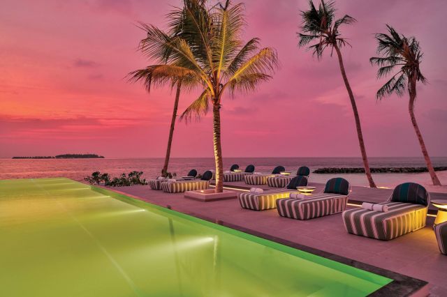 OBLU SELECT Lobigili Swing Bar Pool Side at Sunset