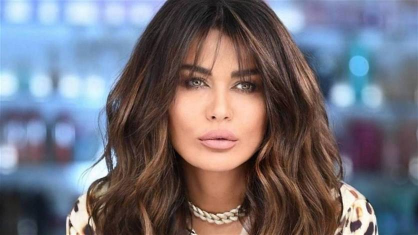 نادين الراسي في جلستها التصويرية الأولى بعد وفاة جورج الراسي
