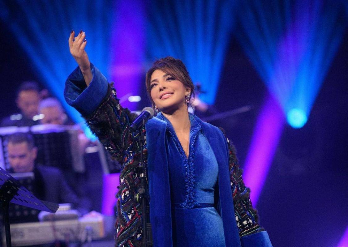 أصالة تكشف سبب وقوفها على المسرح حافية القدمين