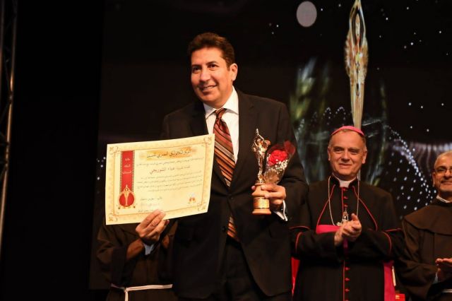 هاني رمزي يتسلم تكريم هناء الشوربجي