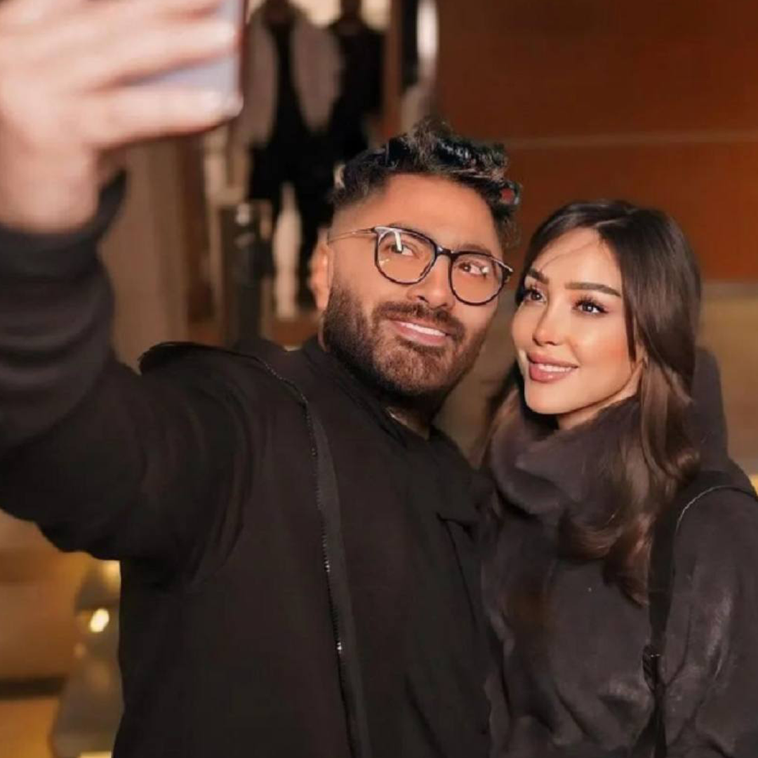 تامر حسني وبسمة بوسيل يحتفلان بتخرّج نجلهما آدم