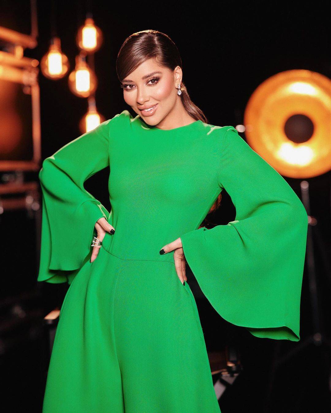 إطلالات  باللون الأخضر للمشهورات... استوحي منها في اليوم الوطني الإماراتي