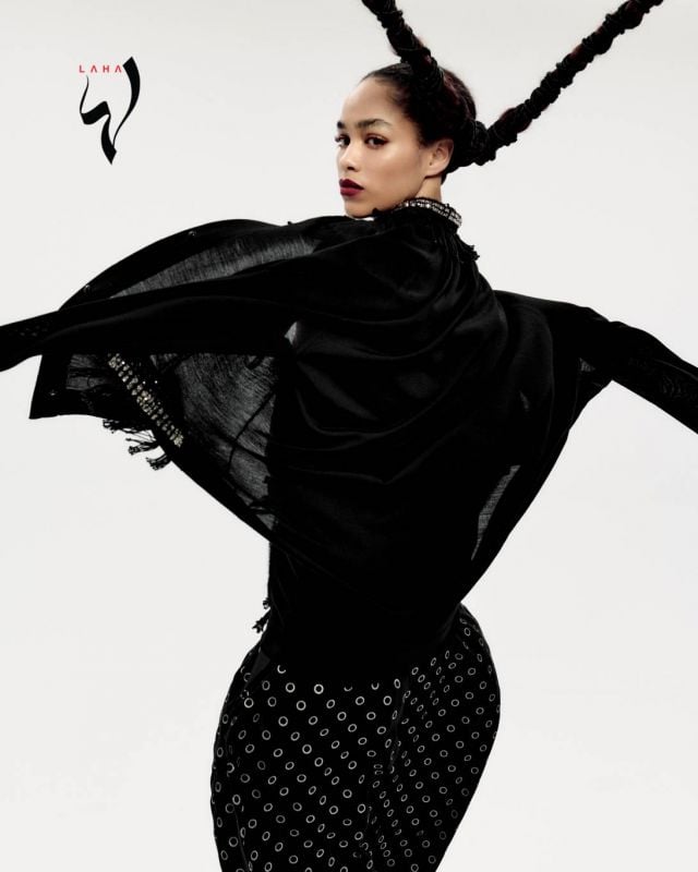 Full look: cardigan, top and trousers – LOUIS VUITTON
