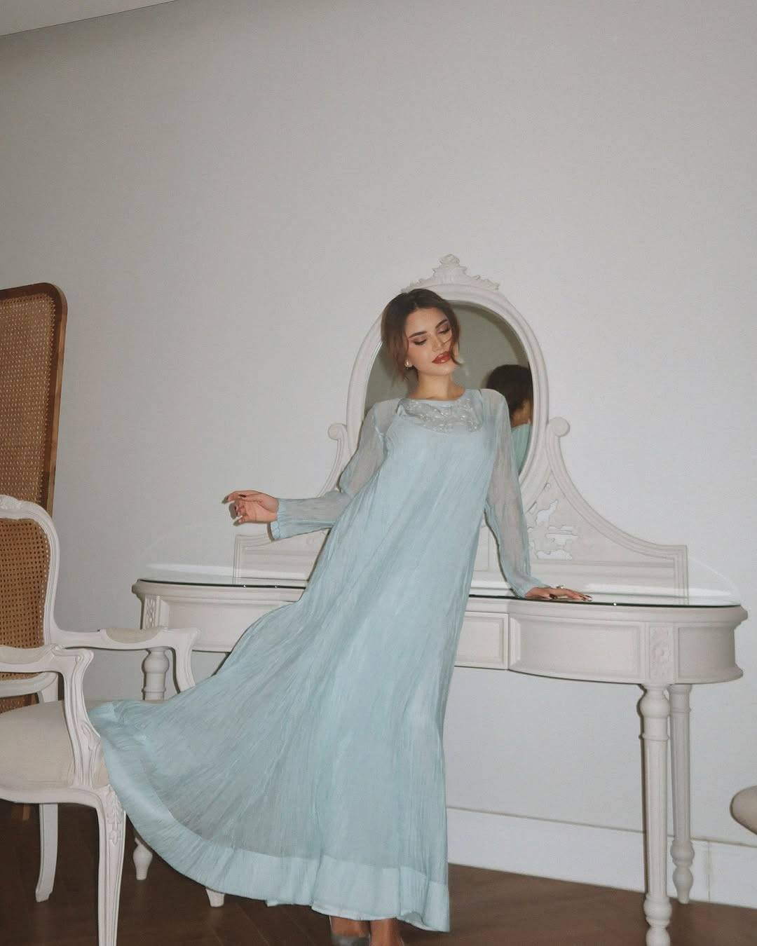 استوحي من إطلالات نجود الرميحي أناقتك في العيد