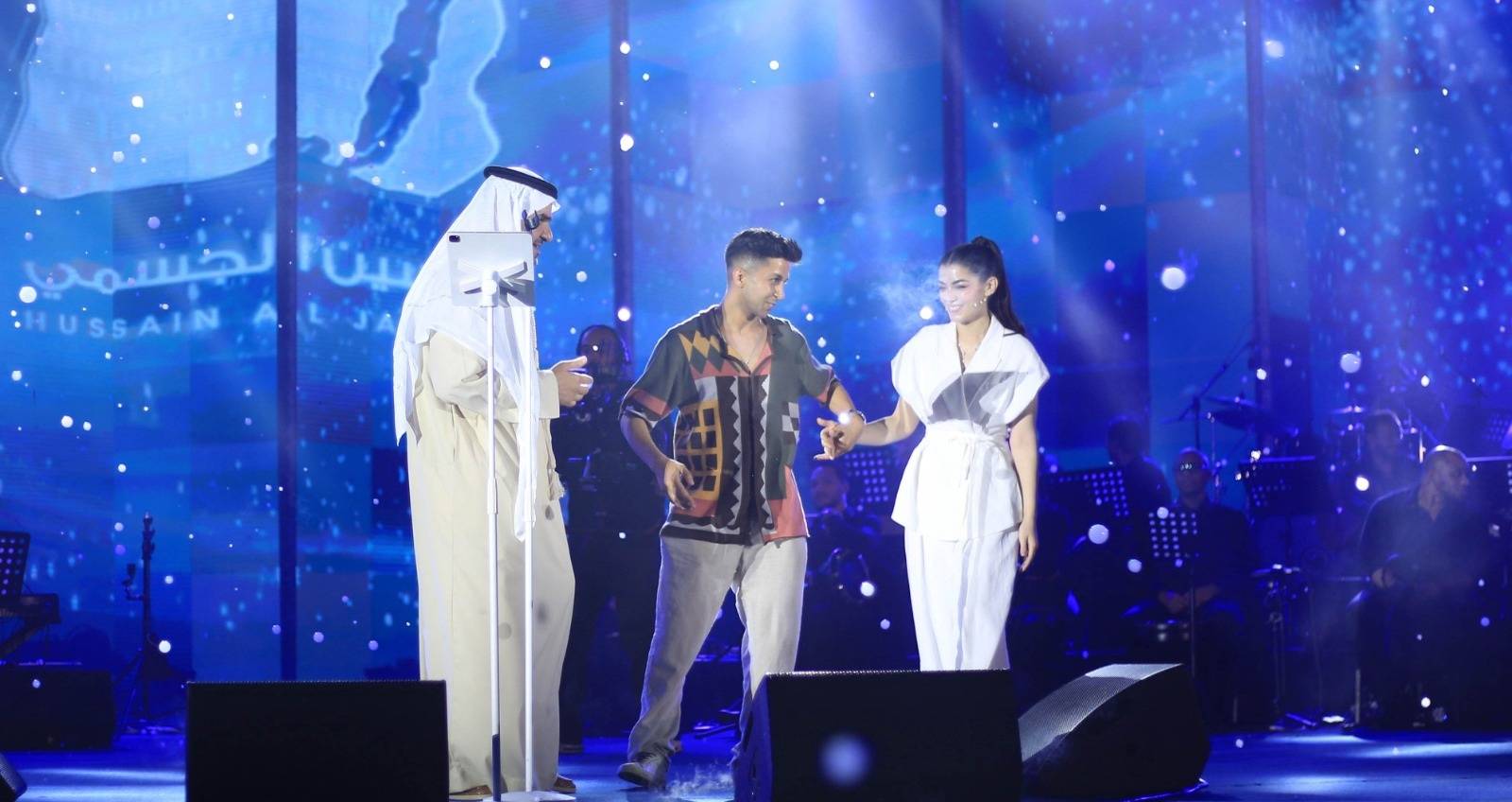 هشام جمال وليلى زاهر مع حسين الجسمي على المسرح