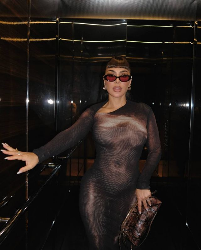 هدى بيوتي تتألق في باريس بإطلالة مموهة من جان بول غوتييه