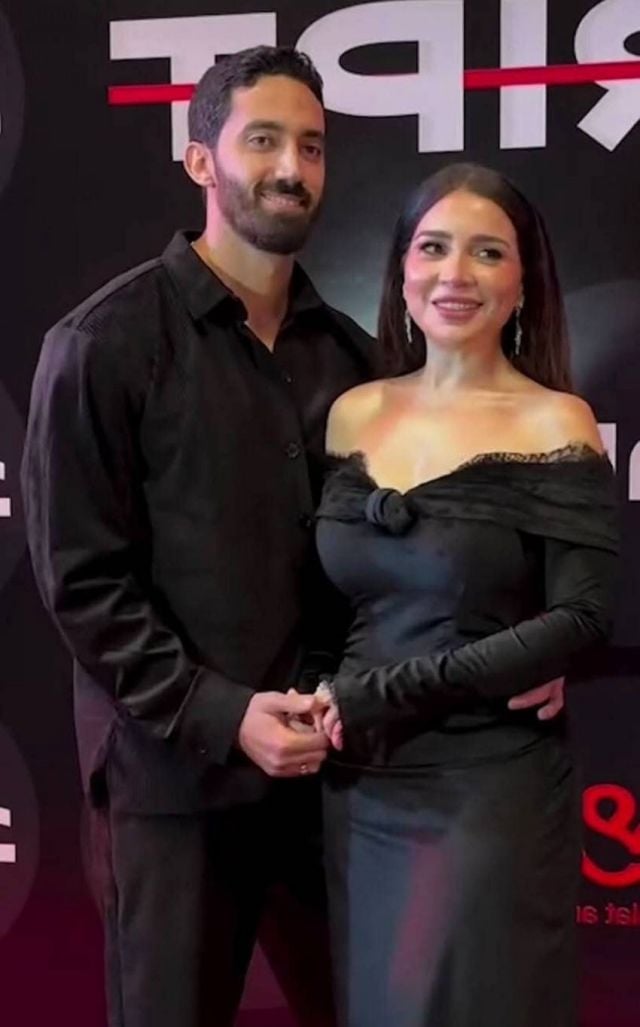 مي عز الدين وزوجها