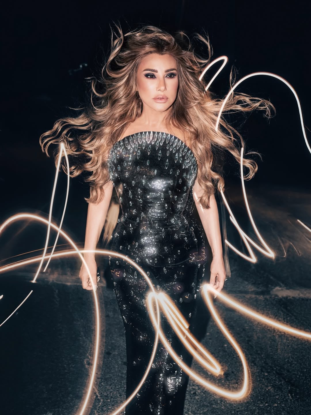نجوى كرم تتألق بفستان أسود مزين بالكريستالات في قطر نجوى كرم تتألق بفستان أسود مزين بالكريستالات في قطر