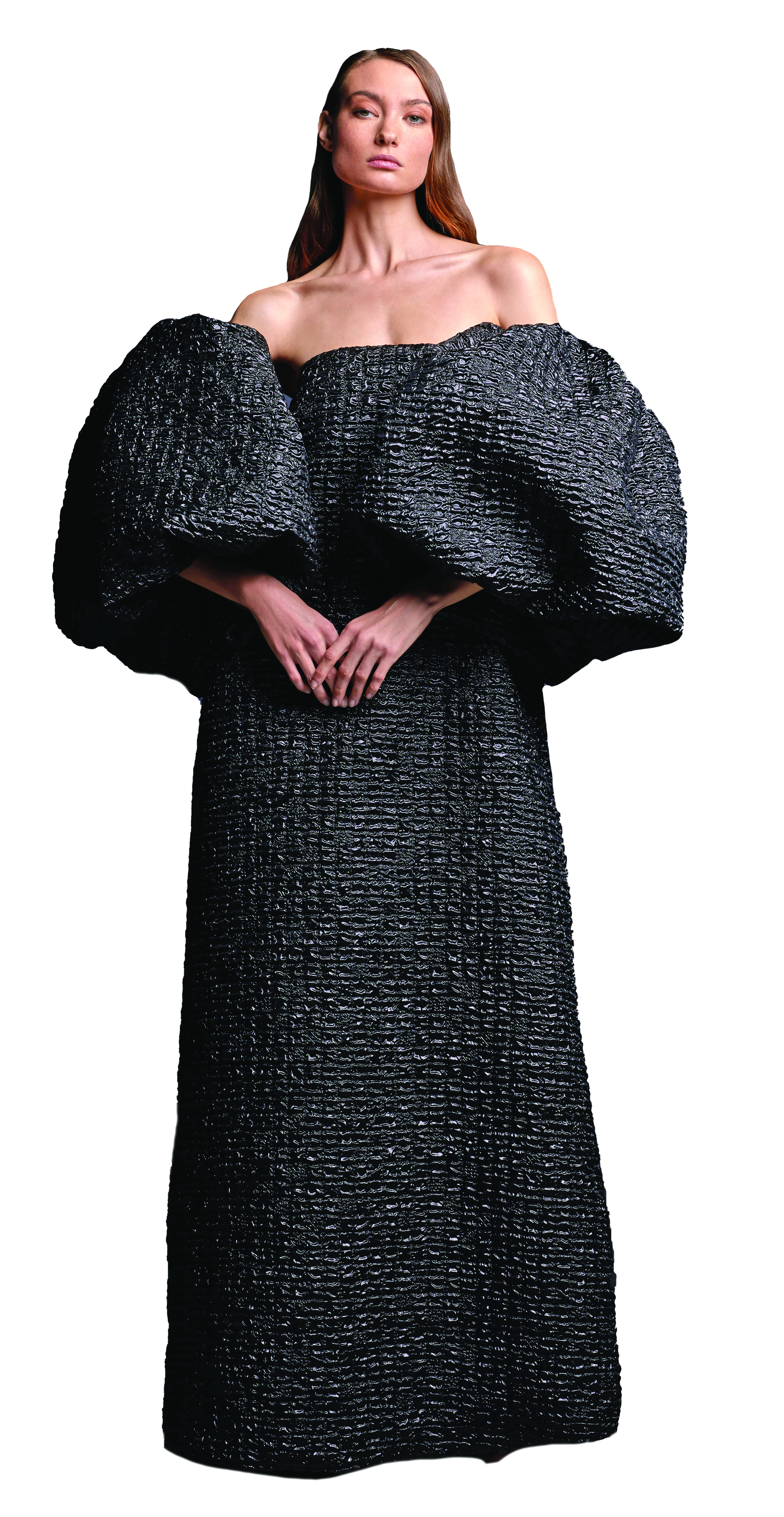 فستان بأكمام منفوشة من تصميم ديما عياد 