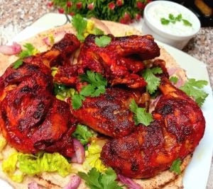 دجاج تندوري: سر التتبيلة المدخنة واللون المثالي من قلب التنور