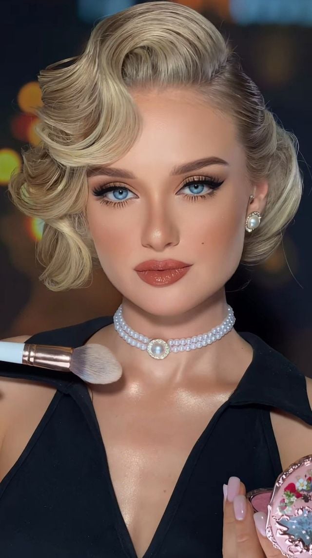 تسريحة شعر  ريترو مع بف جانبي على الغرة